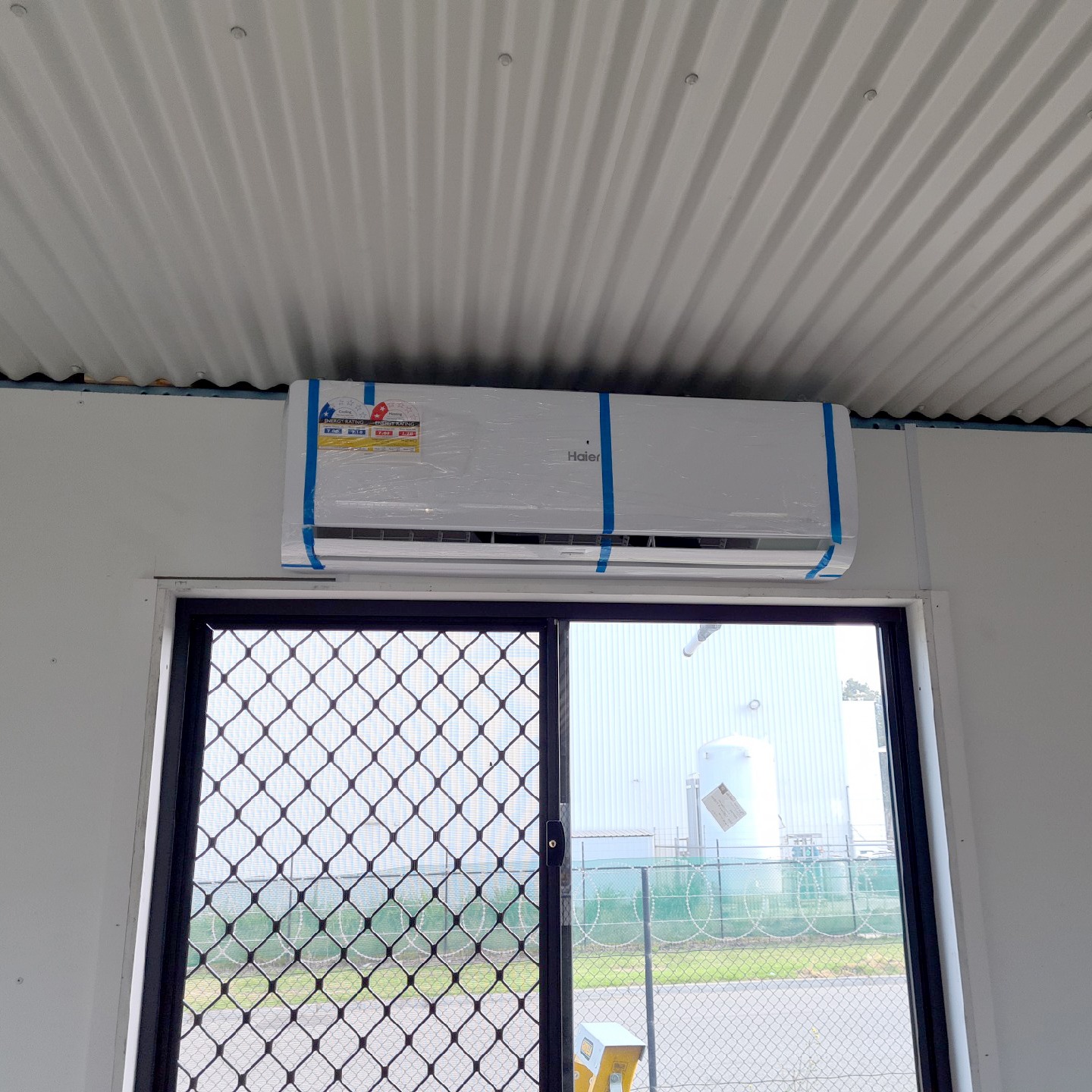 Supply and install high wall split systems to 4 portable buildings classrooms